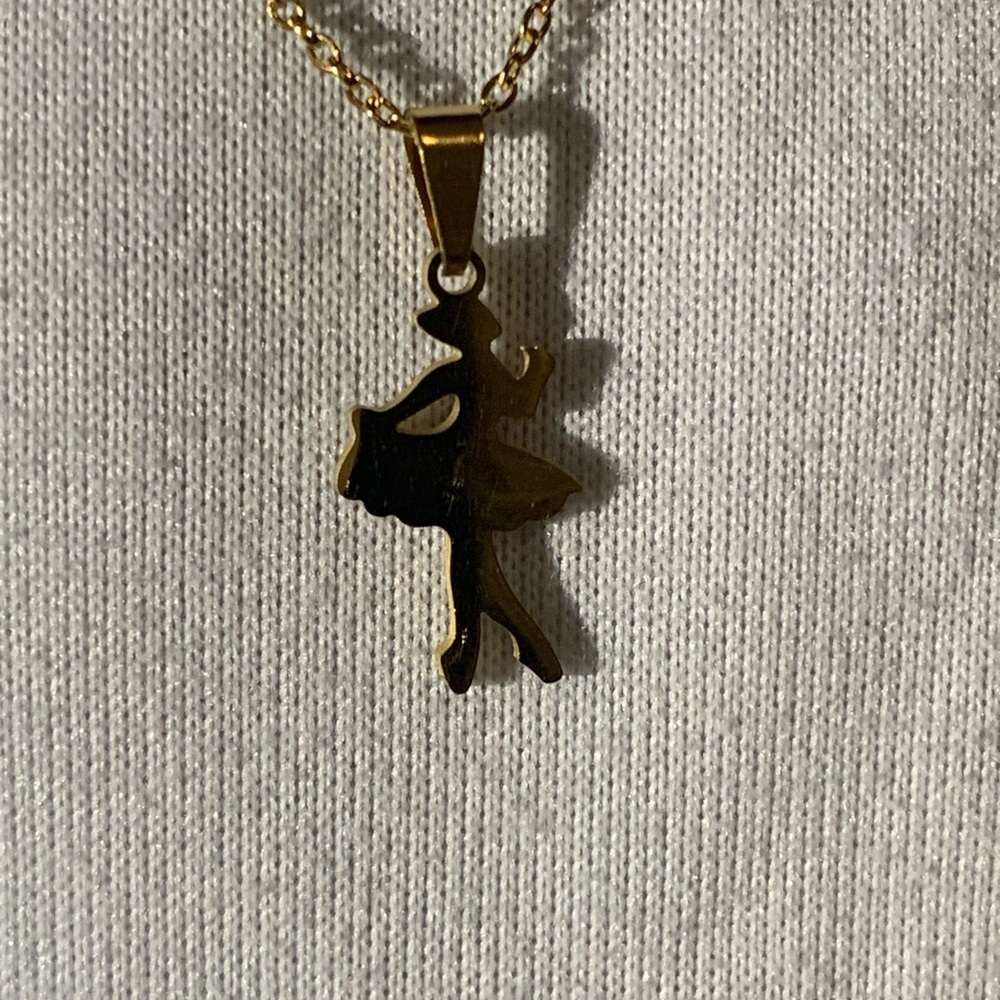 Stain less steel Gold ballerina necklace with earrings